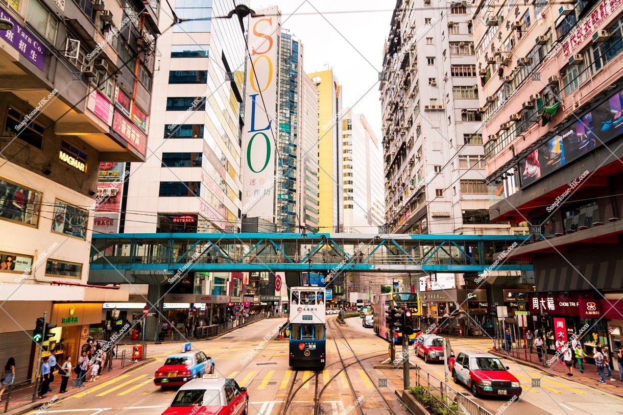 Street view of Causeway Bay with Hong Kong Tramway