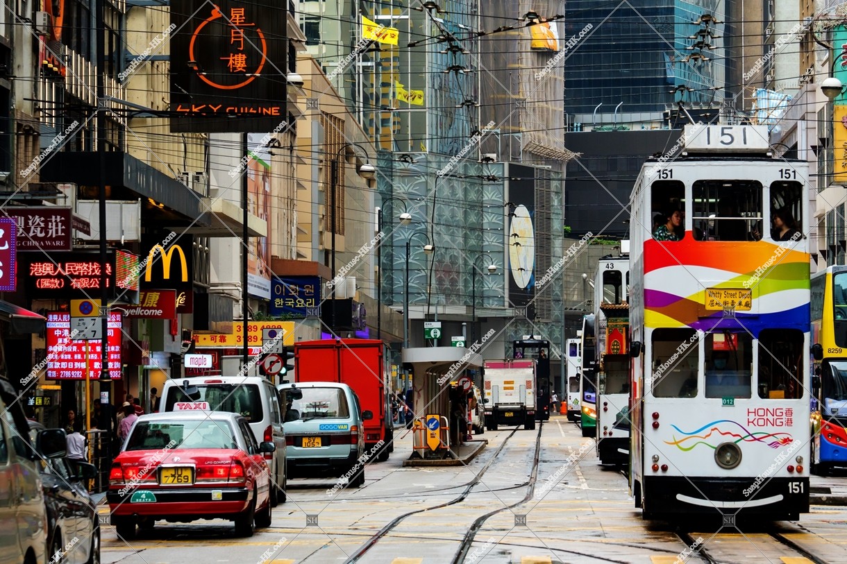 Street view of Des Voeux Road Central with Hong Kong Tramway at Sheung Wan