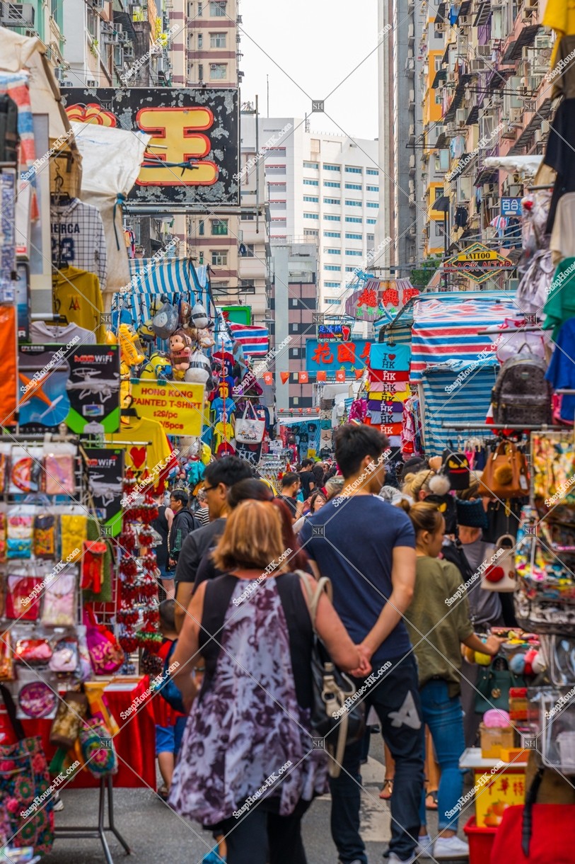 Woman street (Tung Choi Street)  in Mong Kok and peoples walking in the Street