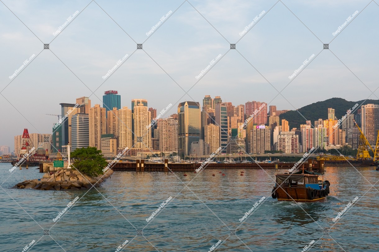 Evening view of North Point with a boat from Typhoon Shelter of Causeway Bay 