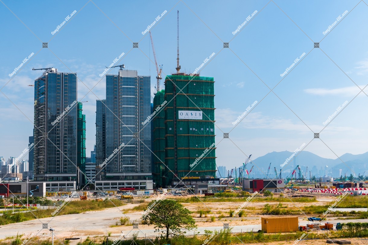 The building and the Kai Tak station under construction at Kai Tak