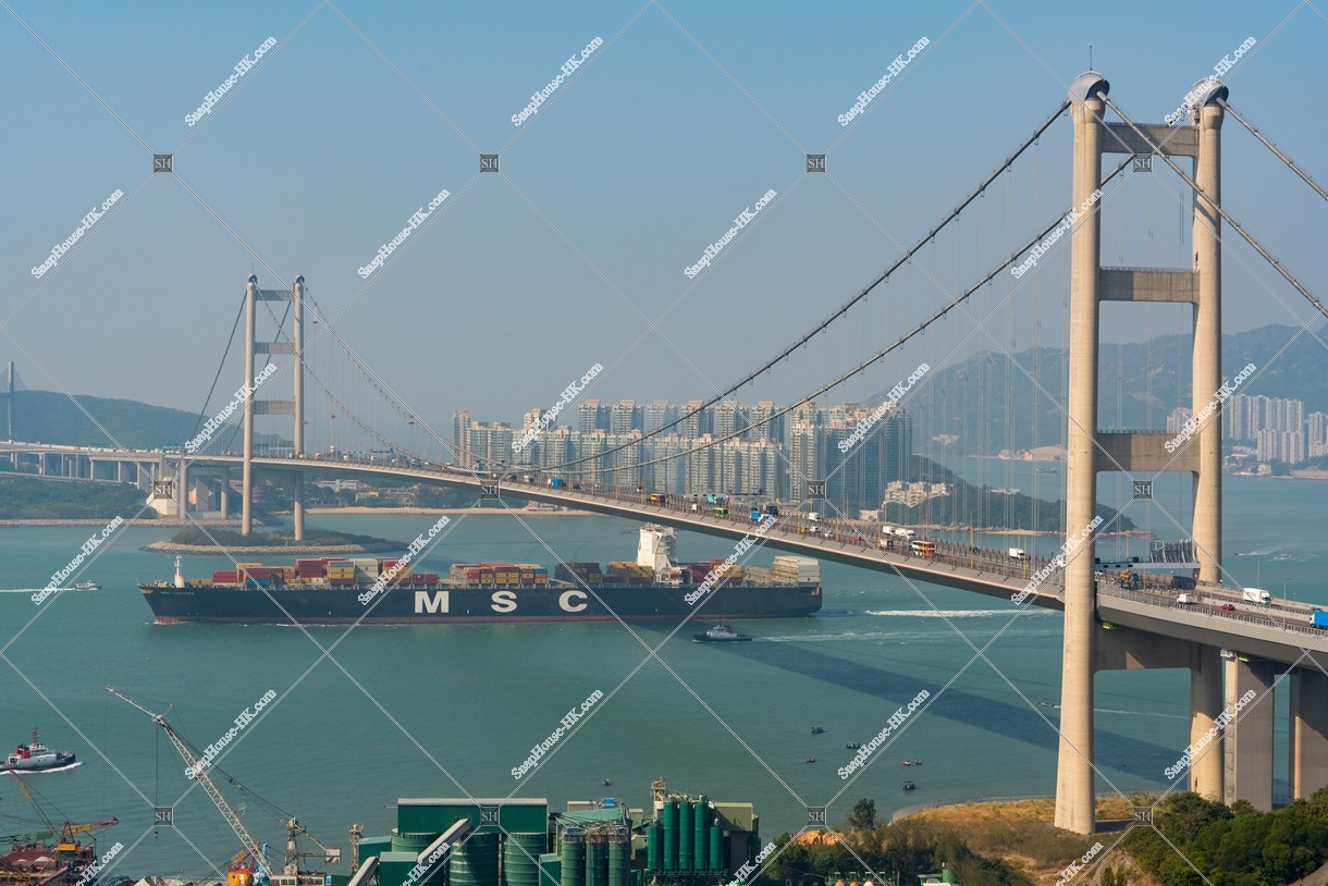 Tsing Ma Bridge with a cargo ship