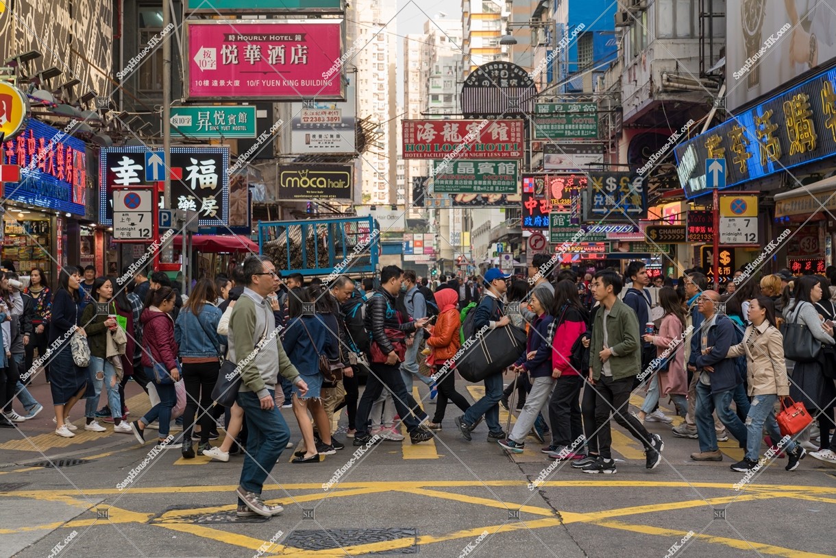 People crossing a pedestrian crossing, Mong Kok
