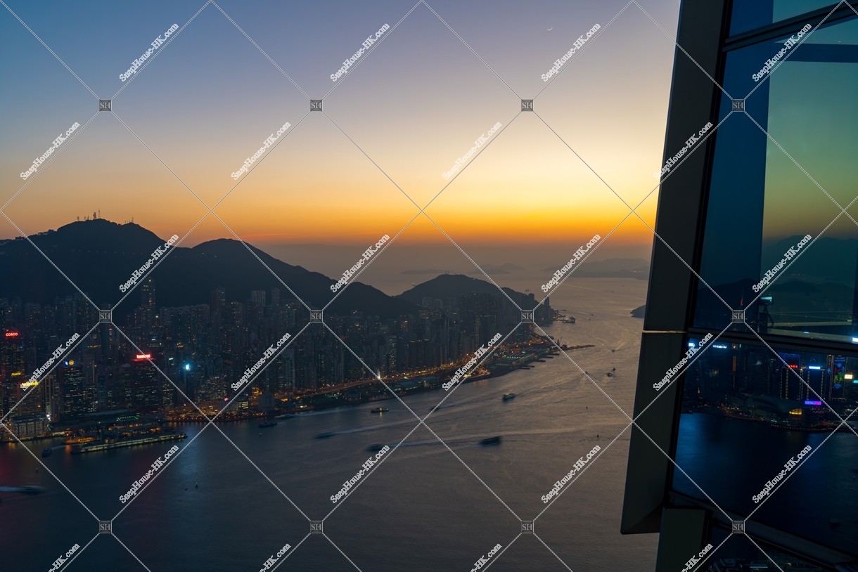 View of sinking sun from SKY100 to Hong Kong Island