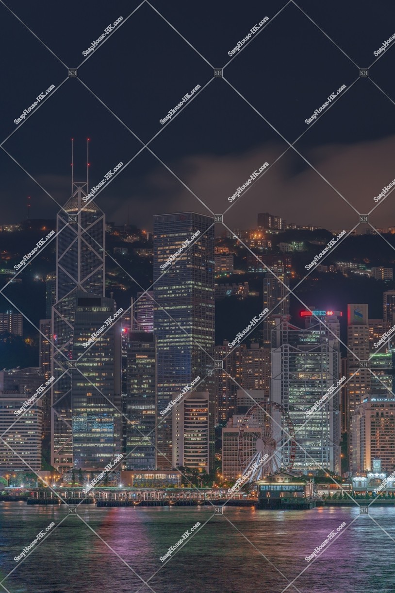 Night view of the Financial high-rise buildings at Central on a cloudy day