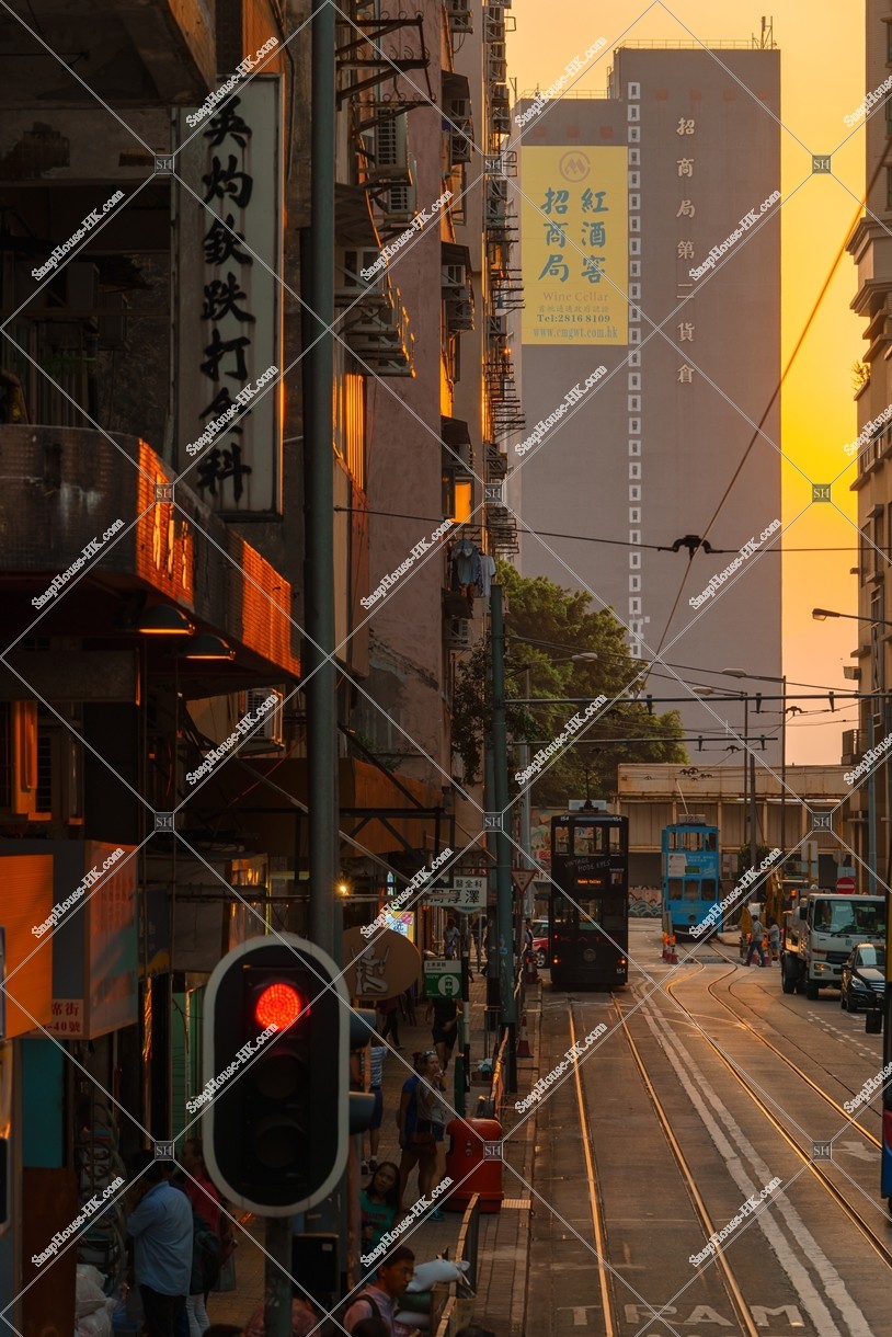 Street view of Kennedy Town in the evening with Hong Kong Tramway, No.2