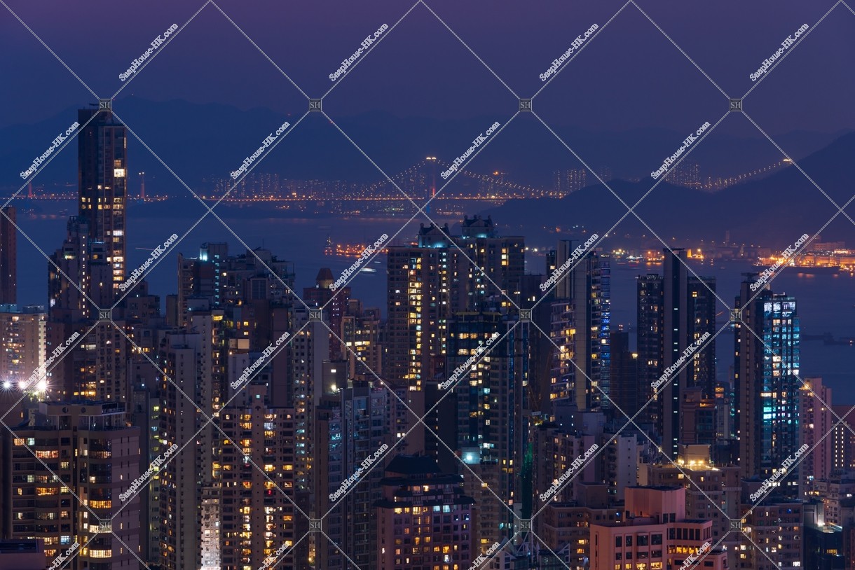 Night view of the high-rise buildings at Sheung Wan and Victoria Harbour