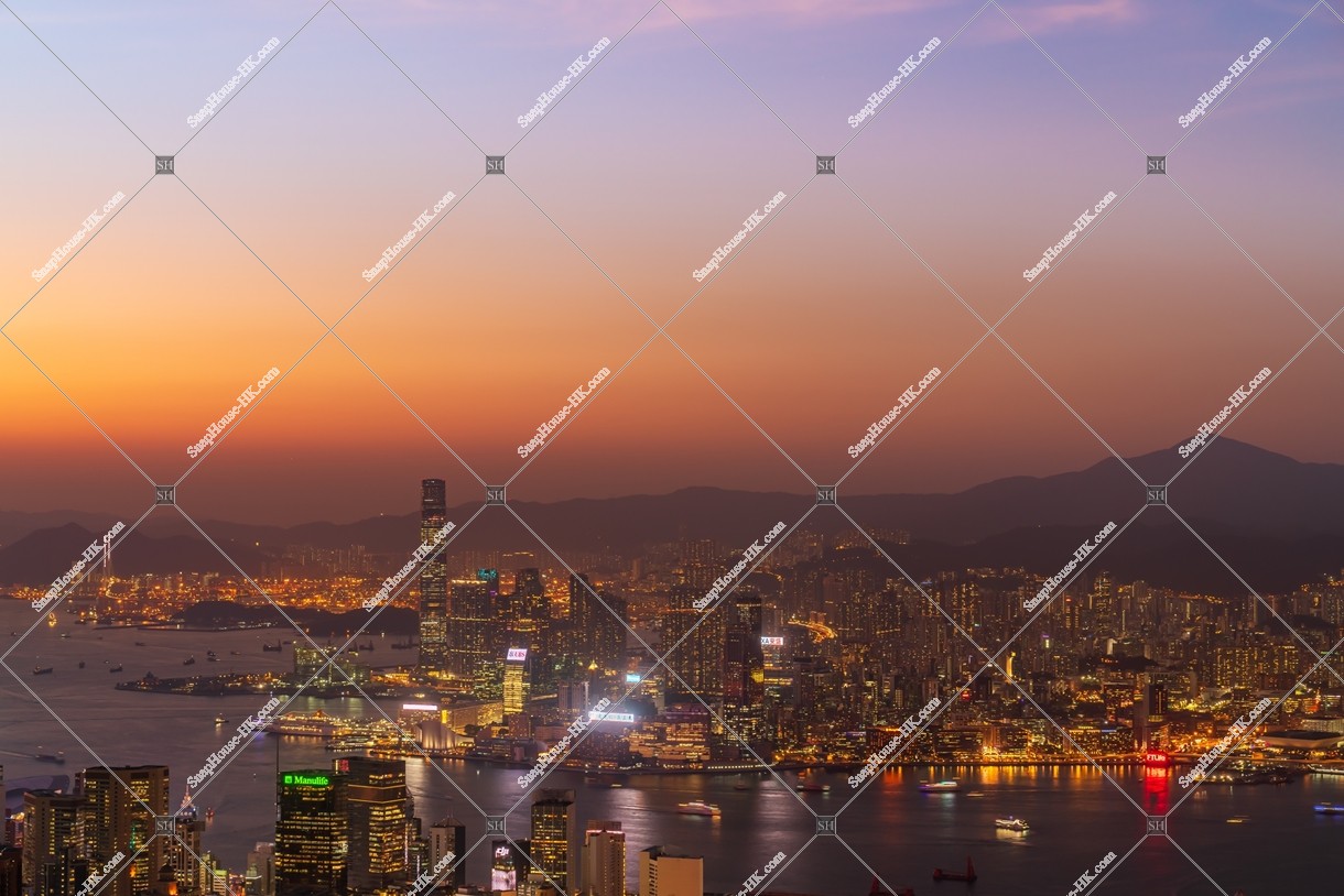 Skyline view of Kowloon Peninsula at dusk