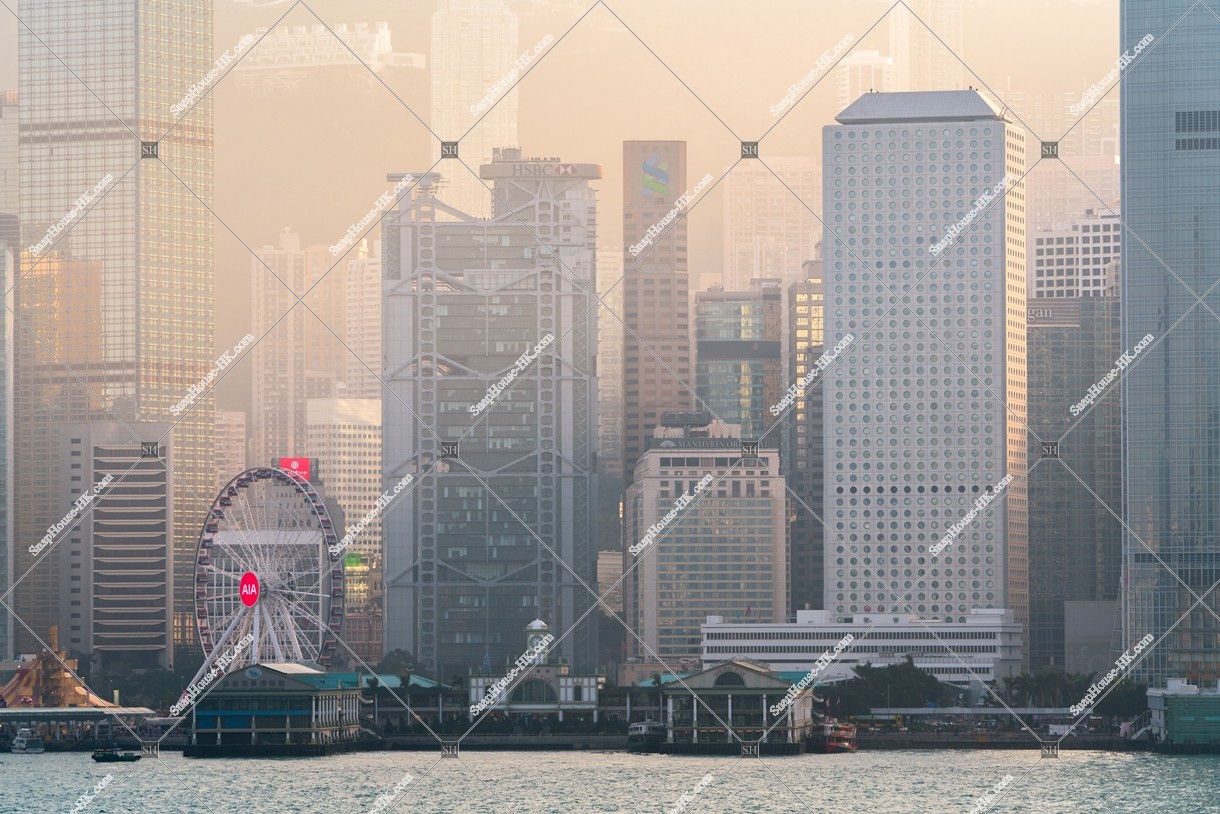 View of the high-rise buildings of Central in smog at sunset time, view from Tsim Sha Tsui, No.2