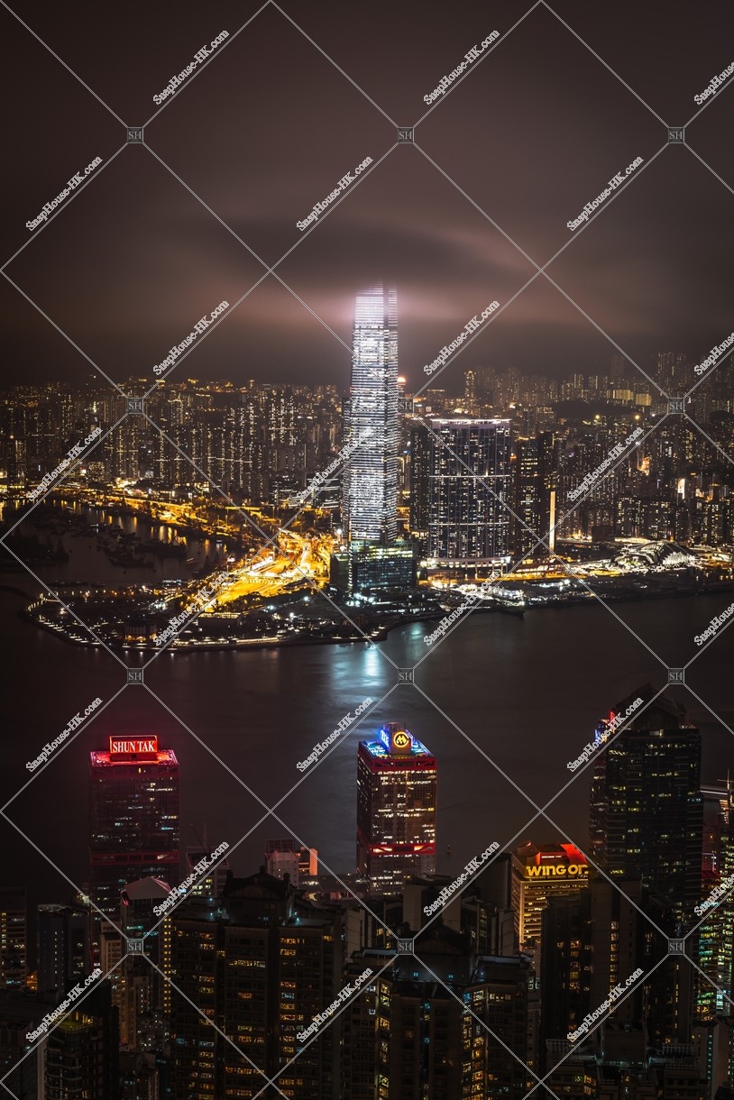 Night view of West Kowloon with cloudy sky, view from The Peak