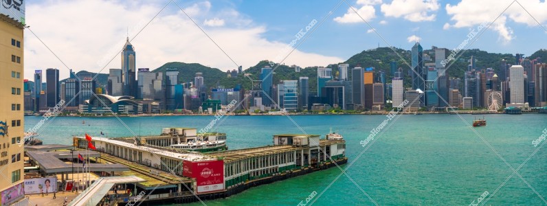 View of  the high-rise buildings of Hong Kong Island and Tsim Sha Tsui Ferry Pier