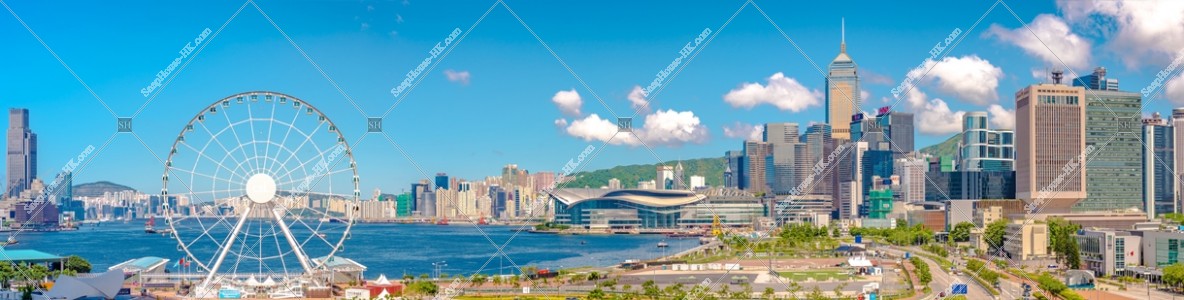 Panoramatic view of The Hong Kong Observation Wheel and high-rise buildings at Wan Chai