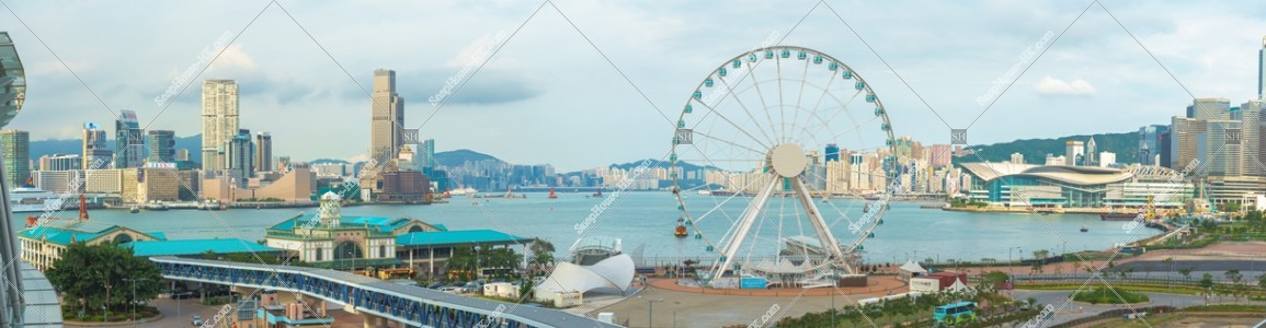 Panoramatic view of The Hong Kong Observation Wheel and Central Ferry Piers at Central