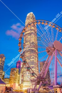 The Hong Kong Observation Wheel and high-rise building "ifc2" at Central after sunset