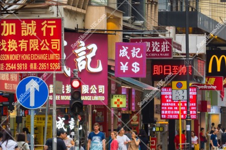 Street view of Des Voeux Road Central with signboards at Sheung Wan