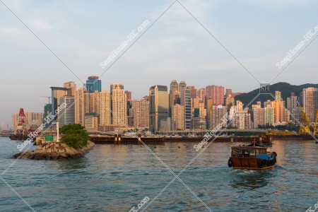 Evening view of North Point with a boat from Typhoon Shelter of Causeway Bay