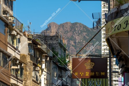 Old street and Lion Rock at Kowloon City