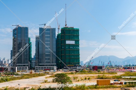 The building and the Kai Tak station under construction at Kai Tak