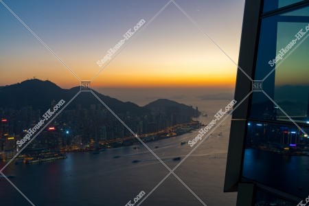 View of sinking sun from SKY100 to Hong Kong Island