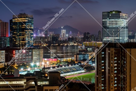 Night view of the buildings and mansions at Kowloon Bay