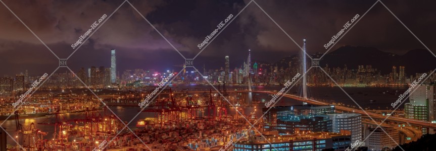Panoramatic night view of Kwai Tsing Container Terminal, West Kowloon and Hong Kong Island