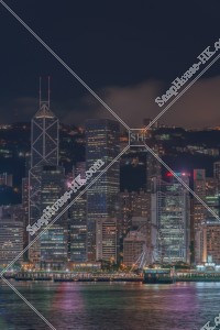 Night view of the Financial high-rise buildings at Central on a cloudy day