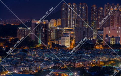 Landscape of houses near Long Ping station at night