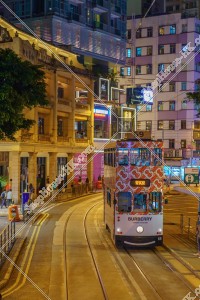 Night street view of Wan Chai with Hong Kong Tramway