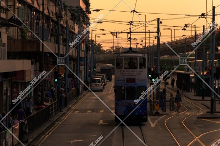 Street view of Sai Wan in the evening with Hong Kong Tramway