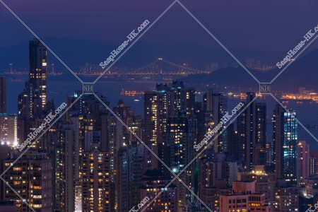 Night view of the high-rise buildings at Sheung Wan and Victoria Harbour