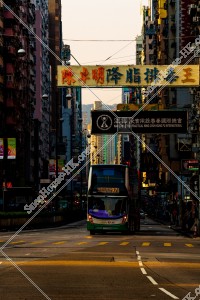 Evening street view of Nathan Road with bus at Yau Ma Tei