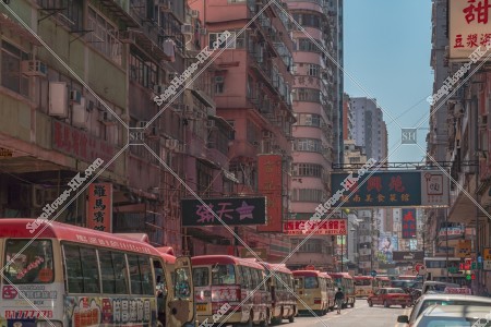 Street view of Mong Kok with minibuses