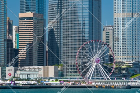 View of high-rise buildings at Central with The Hong Kong Observation Wheel
