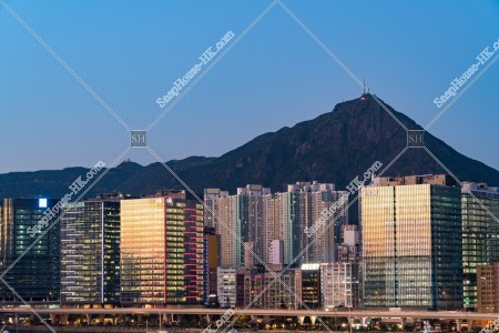View of buildings at Kwun Tong with Kowloon Peak at dsuk