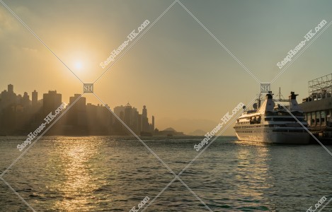 View of high-rise buildings of Hong Kong Island and Victoria Harbour in the evening, No.1